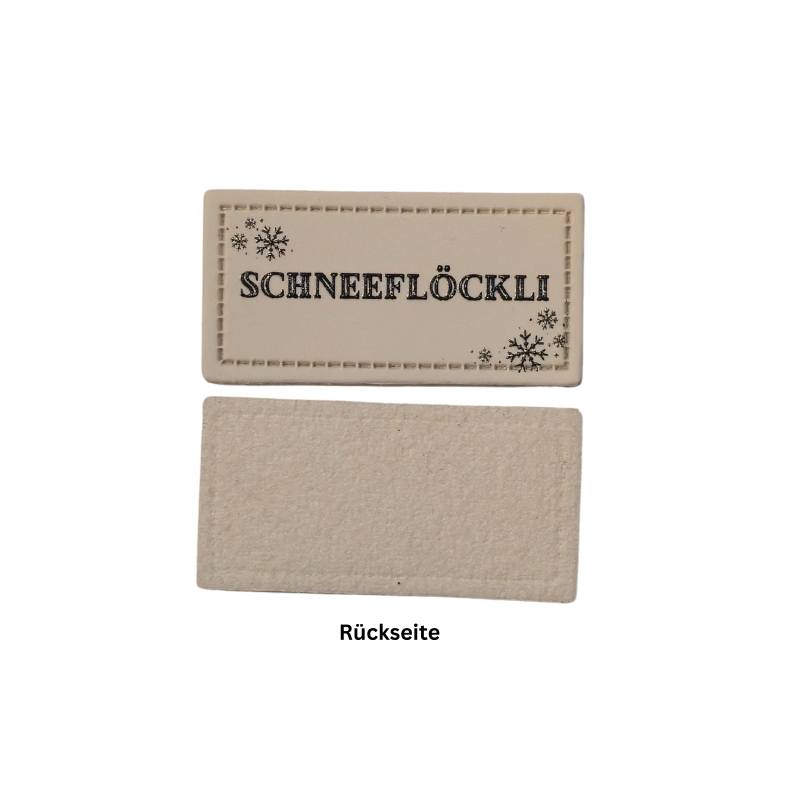 Kreativartikel.ch Kunsteleder Label 4 x 2 cm Schneeflöckli 629 3450 000 Rückseite