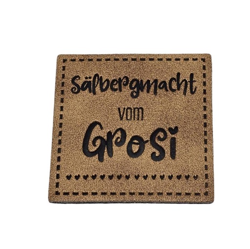 [629 3424 000] "Sälbergmacht vom Grosi" Kunstleder Label 4 x 4 cm