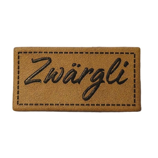 [629 3442 000] "Zwärgli" Kunstleder Label 4 x 2 cm