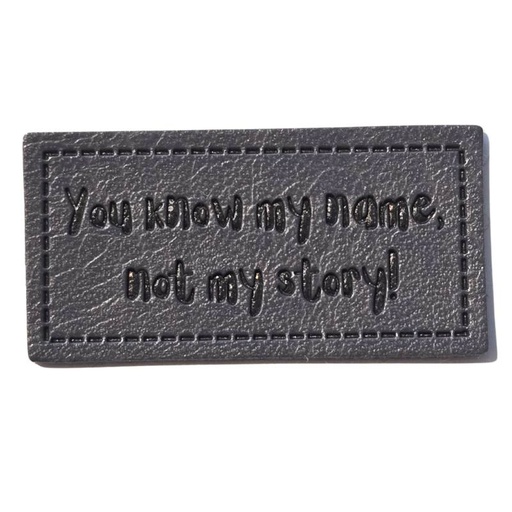 [629 3443 000] "You know my Name, not my story!" Kunstleder Label 4 x 2 cm